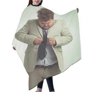 Personality  How Is This Done. Shot Of An Overweight Man In A Suit Trying To Button His Jacket. Hair Cutting Cape