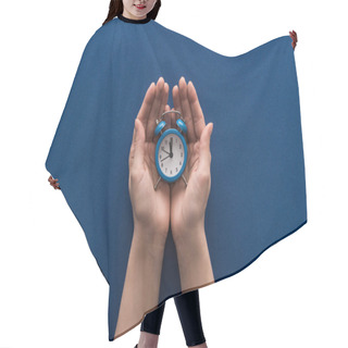 Personality  Cropped View Of Woman Holding Alarm Clock On Blue Background Hair Cutting Cape