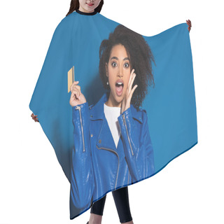 Personality  Shocked African American Woman With Credit Card On Blue Background Hair Cutting Cape