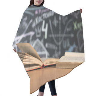 Personality  Open Books Lie On A Desk Or Table Against A Chalk-painted Chalkboard Wall Hair Cutting Cape