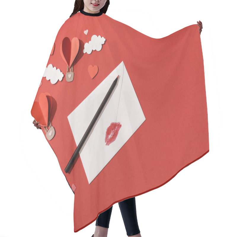 Personality  top view of paper clouds and heart shaped air balloons, envelope with lip print and pencil on red background hair cutting cape