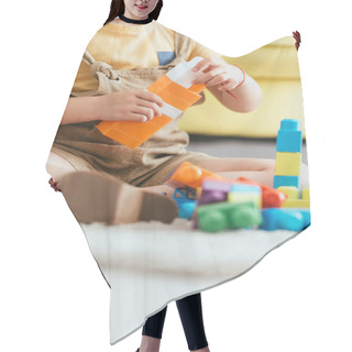 Personality  Partial View Of Child Sitting On Floor And Playing With Multicolored Building Blocks, Selective Focus Hair Cutting Cape