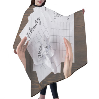 Personality  Cropped Shot Of Male Hands And Teared Calendar On Wooden Tabletop Hair Cutting Cape