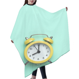 Personality  Yellow Round Alarm Clock On The Cyan Background. Hair Cutting Cape