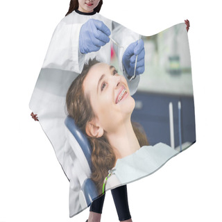 Personality  Cropped View Of Dentist In Latex Gloves Examining Cheerful Woman In Braces  Hair Cutting Cape