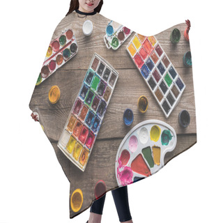Personality  Top View Of Colorful Paint Palettes And Gouache On Wooden Brown Surface Hair Cutting Cape
