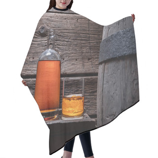 Personality  Golden Brendy Labeled And Shipment From Old Distillery. Glass Of Whiskey With Ice In An Old Distillery. Hair Cutting Cape