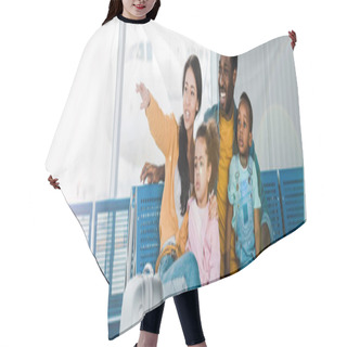 Personality  Panoramic Shot Of Smiling African American Family With Baggage And Kids Sitting In Airport While Mother Pointing With Finger Away Hair Cutting Cape