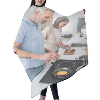 Personality  Side View Of Man Seasoning Pancake Near Blurred Wife Cutting Banana In Kitchen  Hair Cutting Cape