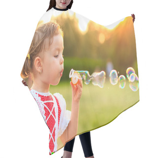 Personality  Child Blowing Soap Bubbles. Hair Cutting Cape
