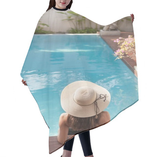 Personality  Back View Of Young Woman In Swimsuit And Hat Sitting In Pool Of Hotel Hair Cutting Cape