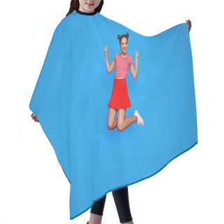 Personality  Full-length Full-size View Of Jumping Laughing And Pretty Woman Dressed In Colourful Bright Clothes Shows A V-sign Isolated On Red Background. Joy Fun Concept. Hair Cutting Cape