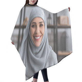 Personality  Smiling Muslim Woman In Hijab Looking At Camera In Living Room, Domestic Violence Concept   Hair Cutting Cape