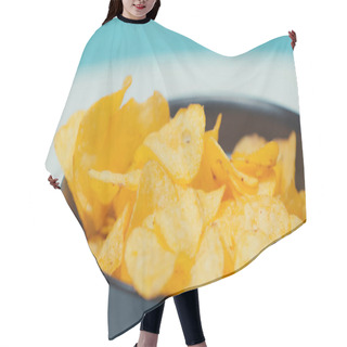 Personality  Close Up View Of Crunchy And Ridged Potato Chips In Bowl On Blue Hair Cutting Cape