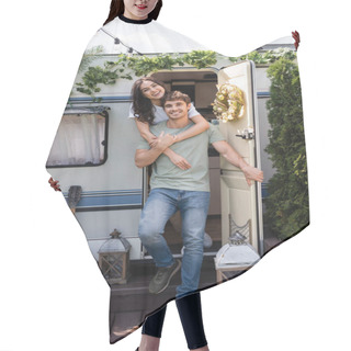 Personality  Smiling Couple Hugging And Looking At Camera Near Door Of Camper Van Outdoors  Hair Cutting Cape