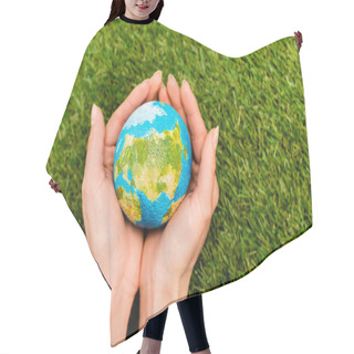 Personality  Cropped View Of Globe In Female Hands On Green Background, Earth Day Concept Hair Cutting Cape
