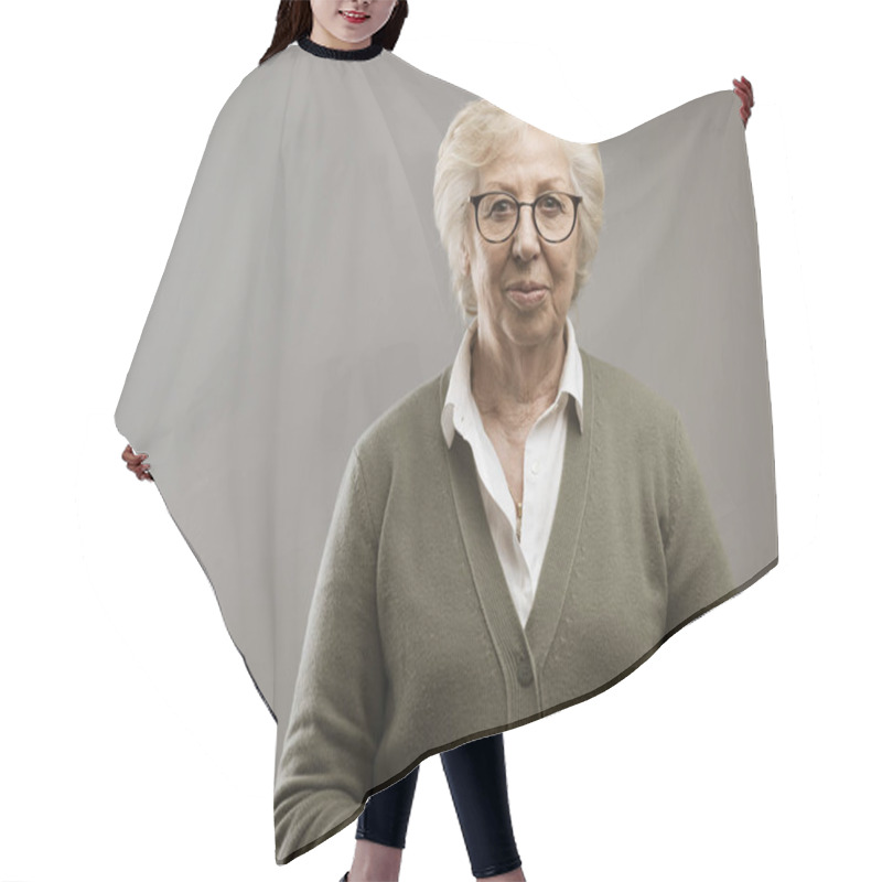 Personality  Serene Old Lady Posing On Gray Background Hair Cutting Cape