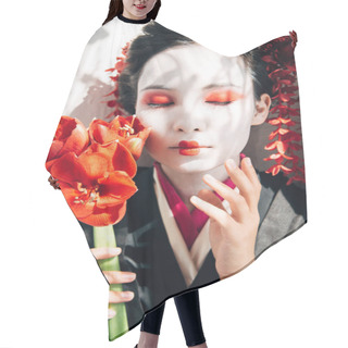 Personality  Portrait Of Beautiful Geisha Holding Red Flowers In Sunlight Hair Cutting Cape