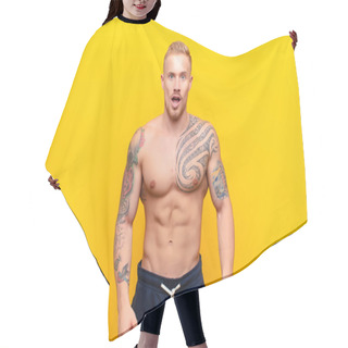 Personality  Young Strong Blonde Man Looking Shocked, Angry, Annoyed Or Disappointed, Open Mouthed And Furious Against Yellow Wall Hair Cutting Cape