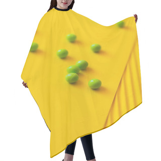 Personality  High Angle View Of Small Green Balls On Yellow And Blurred Background  Hair Cutting Cape