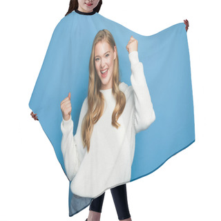 Personality  Happy Blonde Beautiful Woman In Sweater Showing Yeah Gesture Isolated On Blue Background Hair Cutting Cape