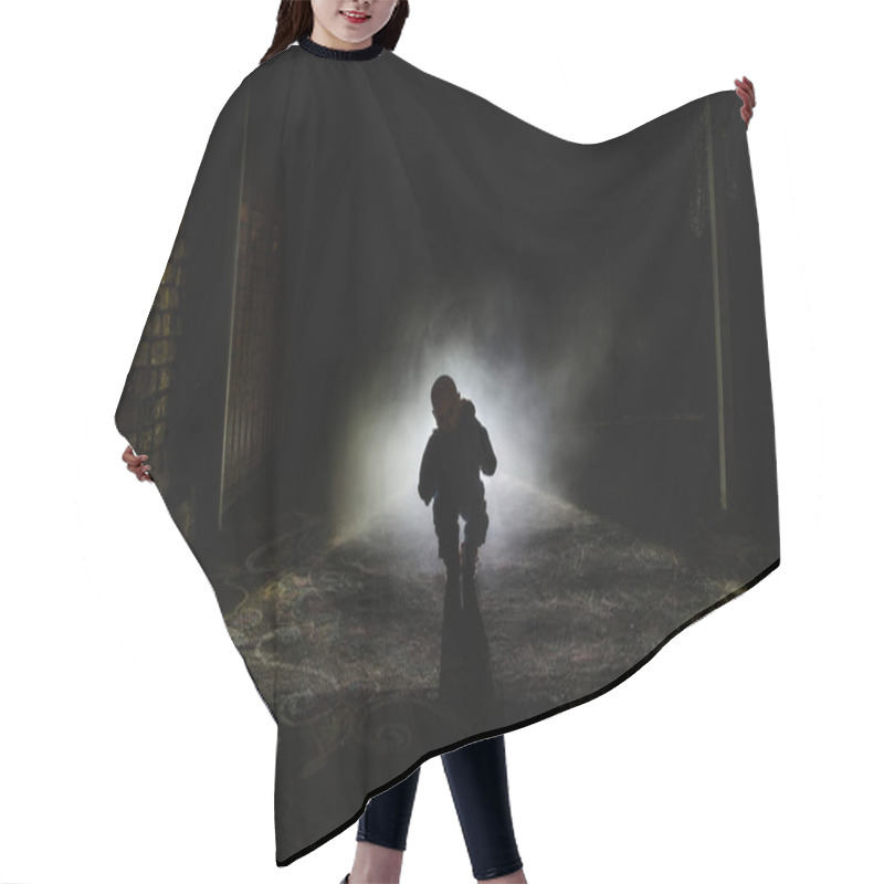 Personality  Horror scene of a scary children's ghost, Silhouette of scary baby doll on dark foggy background with light. hair cutting cape