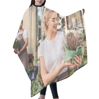 Personality  Attractive Florist Looking At Potted Salvia Flowers Near Flower Shop Hair Cutting Cape