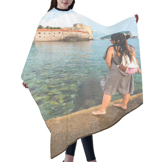 Personality  Woman Standing On Pier With Stari Grad (Old Town) On Background In Budva, Montenegro Hair Cutting Cape