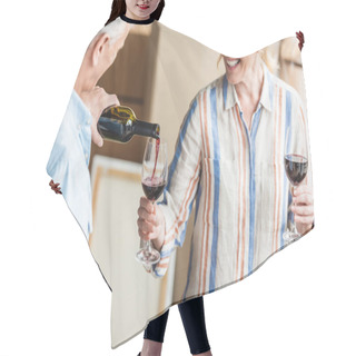 Personality  Cropped Shot Of Grey Hair Man Pouring Wine To Happy Wife While Relocating In New House  Hair Cutting Cape