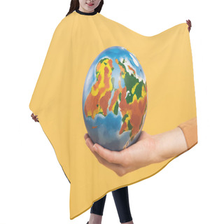 Personality  Cropped View Of Globe In Woman Hand Isolated On Yellow Hair Cutting Cape