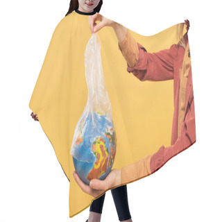 Personality  Cropped View Of Woman Holding Globe And Plastic Package Isolated On Yellow, Global Warming Concept Hair Cutting Cape