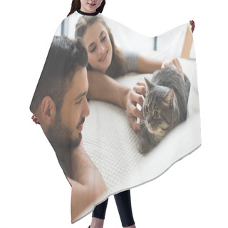 Personality  Happy Young Couple Petting Cat While He Sitting On Couch Hair Cutting Cape
