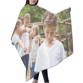Personality  Upset Boy With Friends Gossiping In Background Hair Cutting Cape