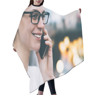 Personality  Cropped View Of Cheerful Young Woman In Eyeglasses With Black Frame Talking On Smartphone Device Using Roaming Connection.Positive Businesswoman Calling On Cellular And Laughing On Bokeh Background Hair Cutting Cape