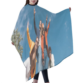 Personality  Low Angle View Of Cheerful Multiethnic Friends Posing Against Blue Cloudy Sky, Banner Hair Cutting Cape