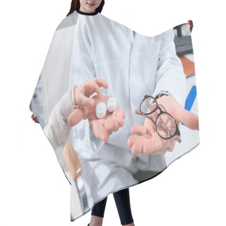 Personality  Cropped View Of Kid Choosing In Glasses Or Eye Lenses In Optics  Hair Cutting Cape