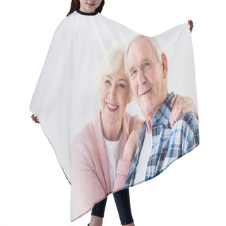 Personality  Portrait Of Happy Senior Couple Looking At Camera Hair Cutting Cape