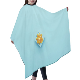 Personality  Top View Of Bright Gift Box With Golden Bow On Blue Background Hair Cutting Cape