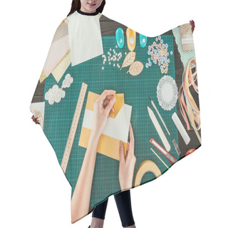 Personality  Cropped Image Of Designer Taking Off Adhesive Tape From Sheet Of Paper Hair Cutting Cape
