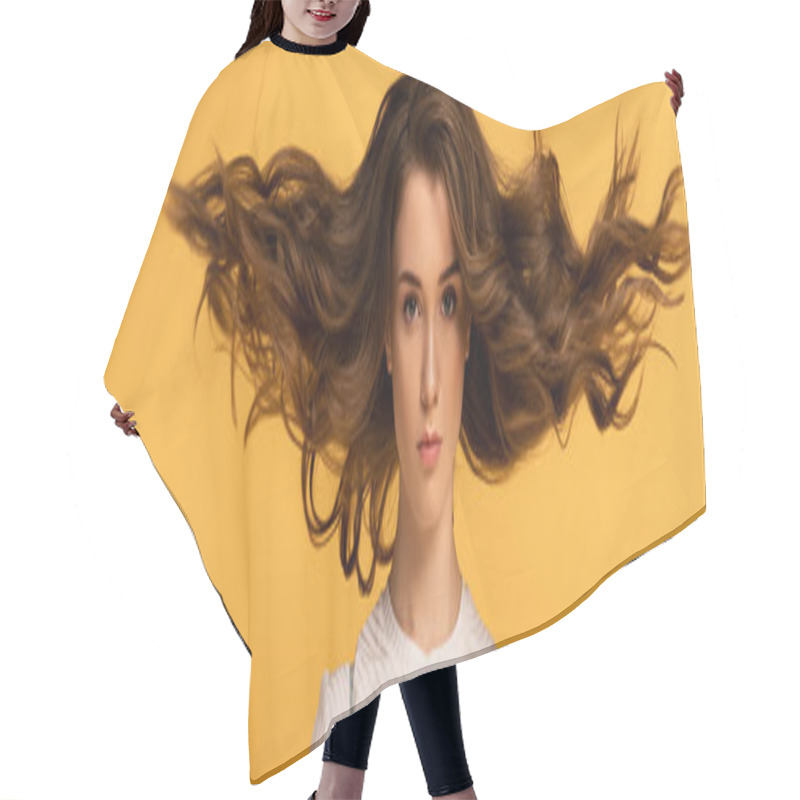 Personality  panoramic shot of beautiful confident spring woman with long hair isolated on yellow hair cutting cape