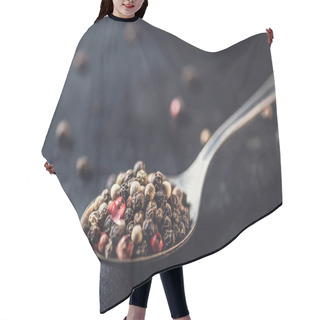 Personality  Close-up View Of Spoon With Dried Aromatic Peppercorns On Black Hair Cutting Cape