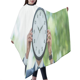 Personality  Panoramic Shot Of Businessman Covering Face With Clock While Standing In Park Hair Cutting Cape