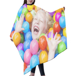 Personality  Blond Girl Child Having Fun Playing In Colored Balls Hair Cutting Cape