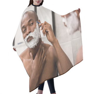 Personality  Selective Focus Of Handsome African American Man Shaving With Foam And Razor Hair Cutting Cape