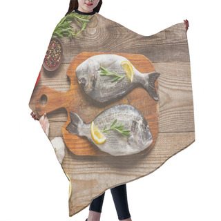 Personality  Top View Of Raw Fish On Wooden Board With Rosemary And Lemon On Table Hair Cutting Cape