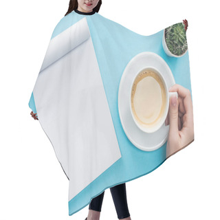 Personality  Cropped View Of Person Holding Cup Of Coffee, Blank Notebook And Pencil On Blue Background Hair Cutting Cape