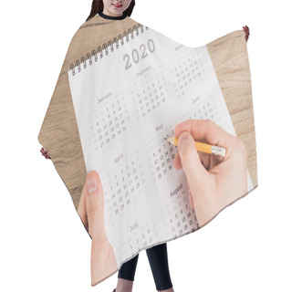 Personality  Cropped View Of Man Noting Date With Pencil On Calendar On Wooden Background Hair Cutting Cape