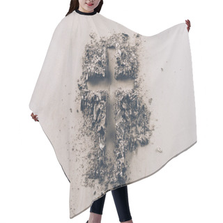 Personality  Top View Of Cross Shape From Ash On White Tabletop  Hair Cutting Cape