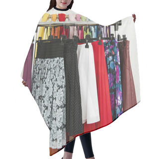 Personality  Cute Summer Skirts Displayed On A Rack. Hair Cutting Cape