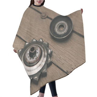 Personality  A Closeup Of Greasy Bicycle Sprocket On A Wooden Floor Hair Cutting Cape